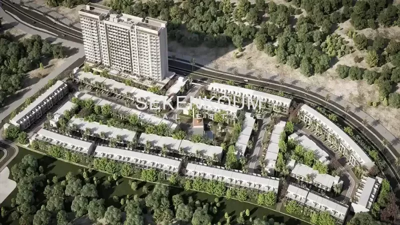 Appartements et maisons de ville haut de gamme dans le parc d'investissement de Dubaï